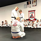 Students training Brazilian Jiu-Jitsu at the academy